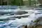 A flowing whitewater in the middle of nature